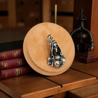 Silver Santa Muerte pendant - Skeleton Goddess in Hooded Cloak and Bow-Tied Top   Gothic Death Jewelry