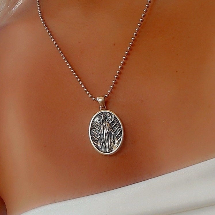 Handmade  Santa Muerte Pendant With Intricate Details - A Distinctly Crafted Necklace