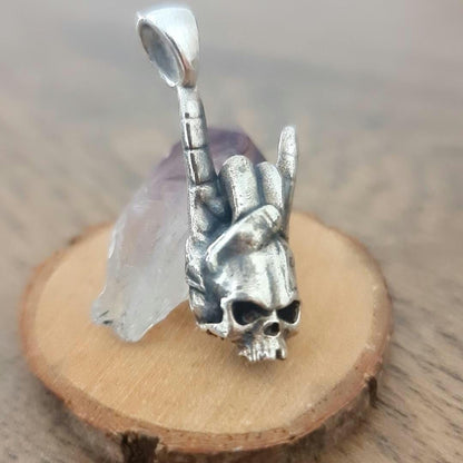 Sterling Silver Rock On Skull Pendant: Punk Gothic Jewelry