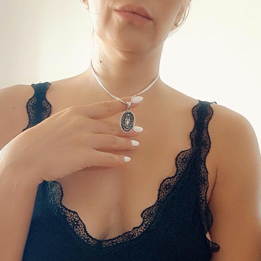 Sterling Silver La Santa Muerte Pendant: Gothic Zircon Skull Amulet