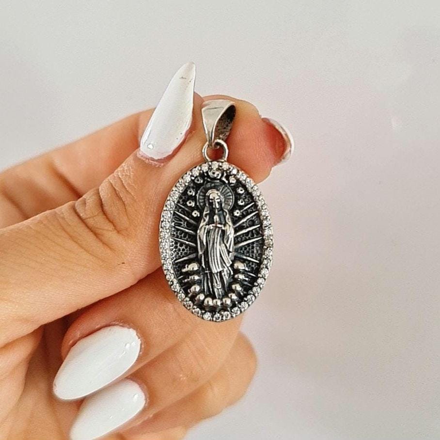 Sterling Silver La Santa Muerte Pendant: Gothic Zircon Skull Amulet