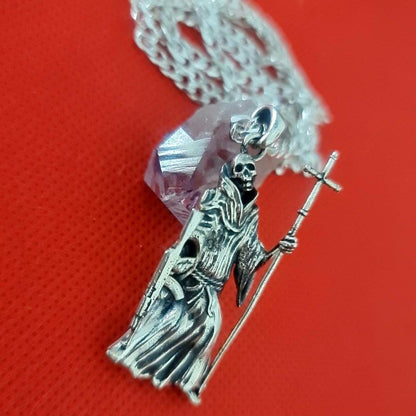 La Santa Muerte 925 Sterling Silver pendant holding a Cross and a Gun - 5CM ( 2 INCHES )