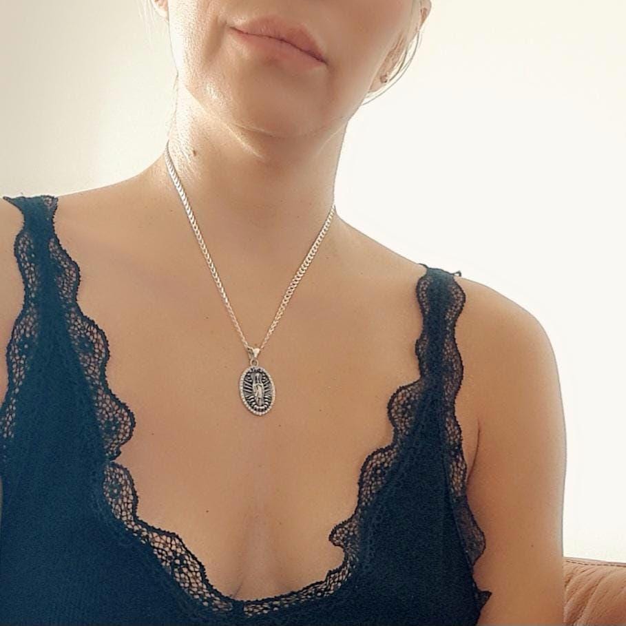 Sterling Silver La Santa Muerte Pendant: Gothic Zircon Skull Amulet