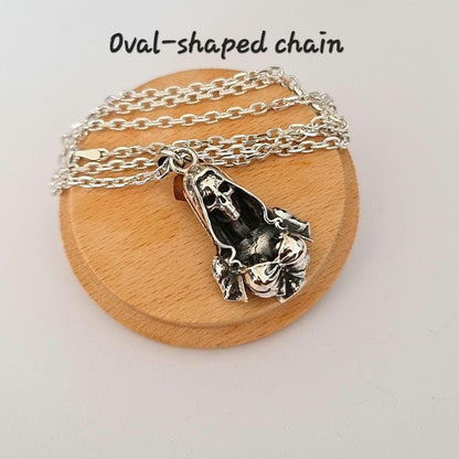 Silver Santa Muerte pendant - Skeleton Goddess in Hooded Cloak and Bow-Tied Top   Gothic Death Jewelry