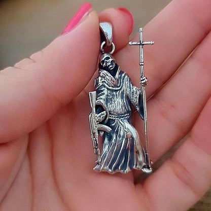 La Santa Muerte 925 Sterling Silver pendant holding a Cross and a Gun - 5CM ( 2 INCHES )