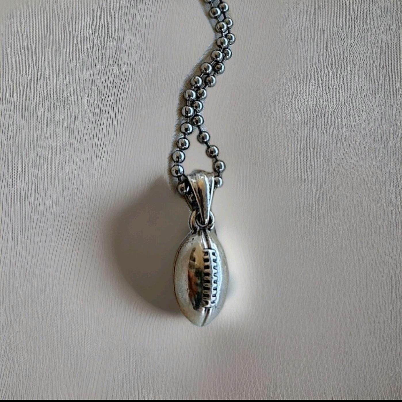 Handmade Sterling Silver Rugby Ball Pendant: Sports Gift