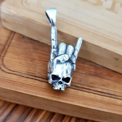 Sterling Silver Rock On Skull Pendant: Punk Gothic Jewelry
