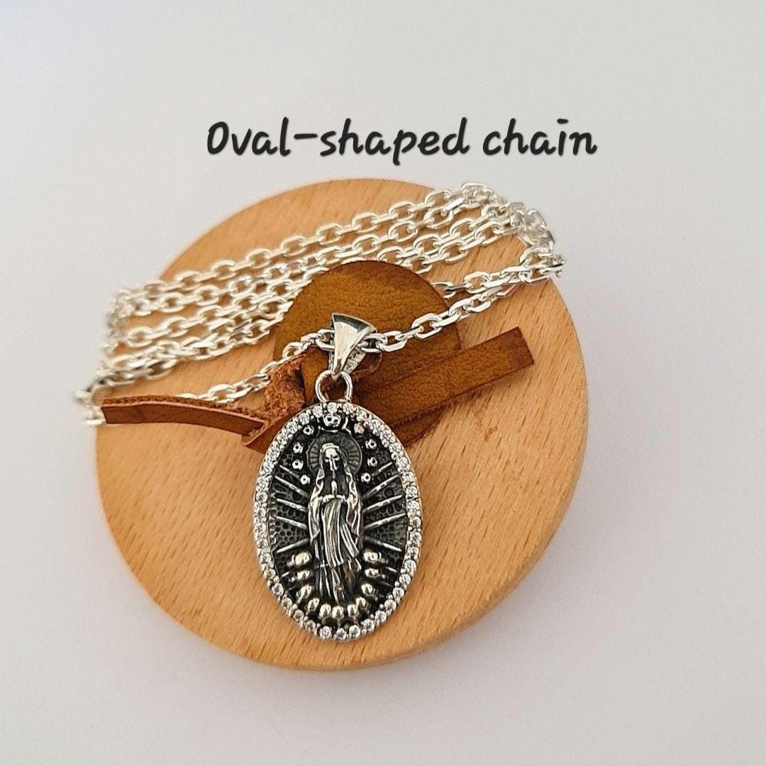 Sterling Silver La Santa Muerte Pendant: Gothic Zircon Skull Amulet