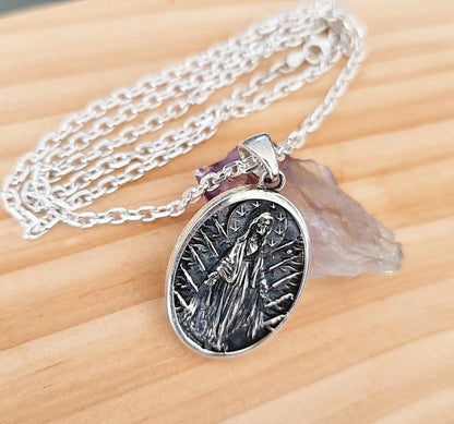 Handmade  Santa Muerte Pendant With Intricate Details - A Distinctly Crafted Necklace