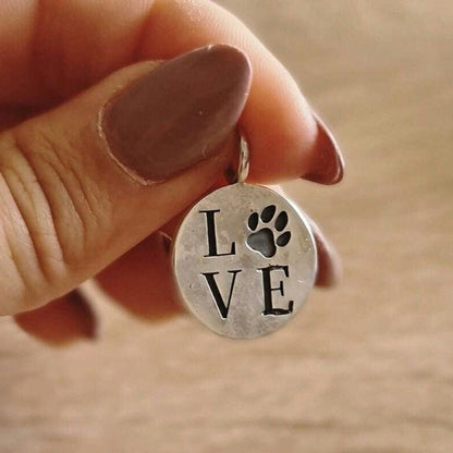 Handmade Silver Paw Print Pendant: Minimalist Pet Lover Necklace