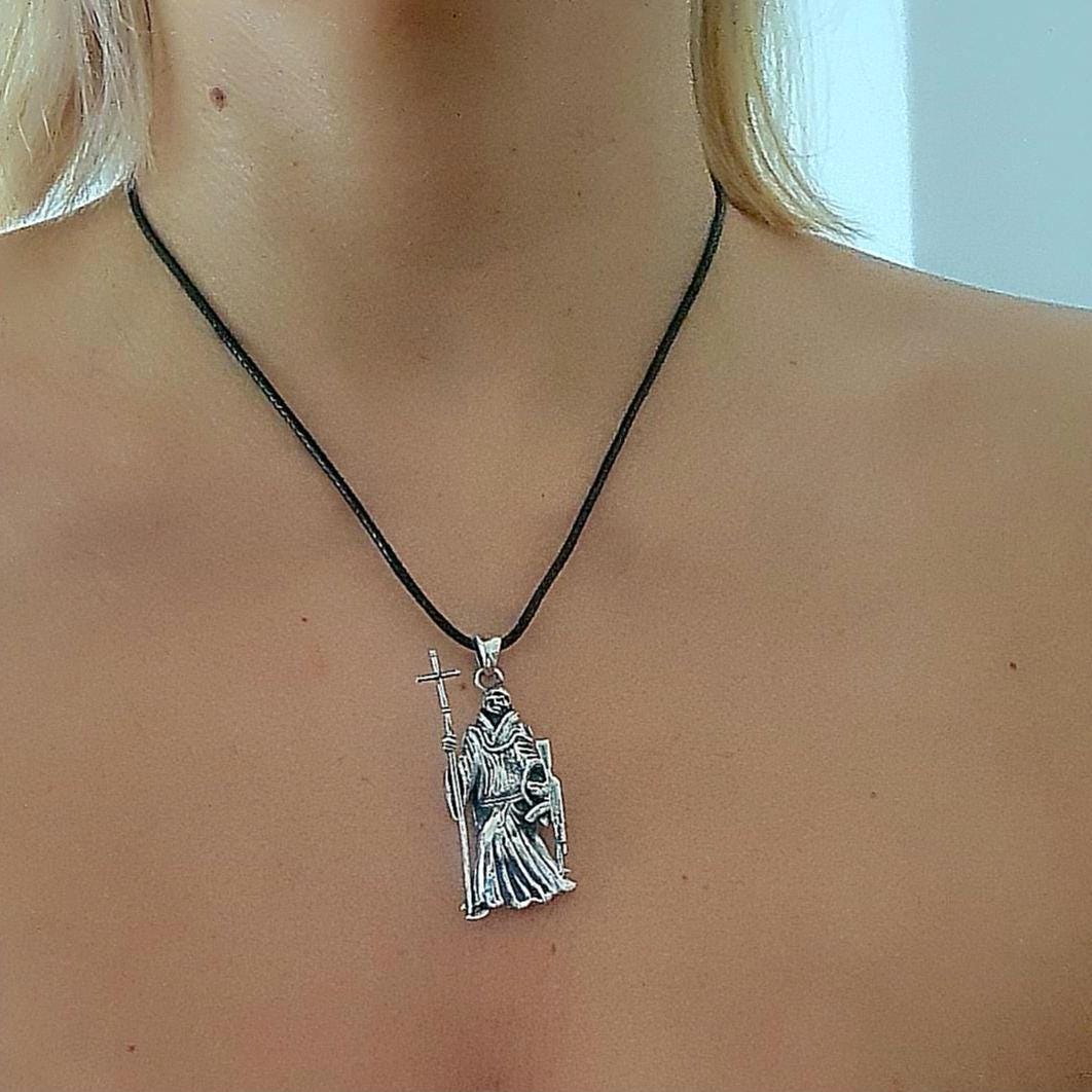 La Santa Muerte 925 Sterling Silver pendant holding a Cross and a Gun - 5CM ( 2 INCHES )