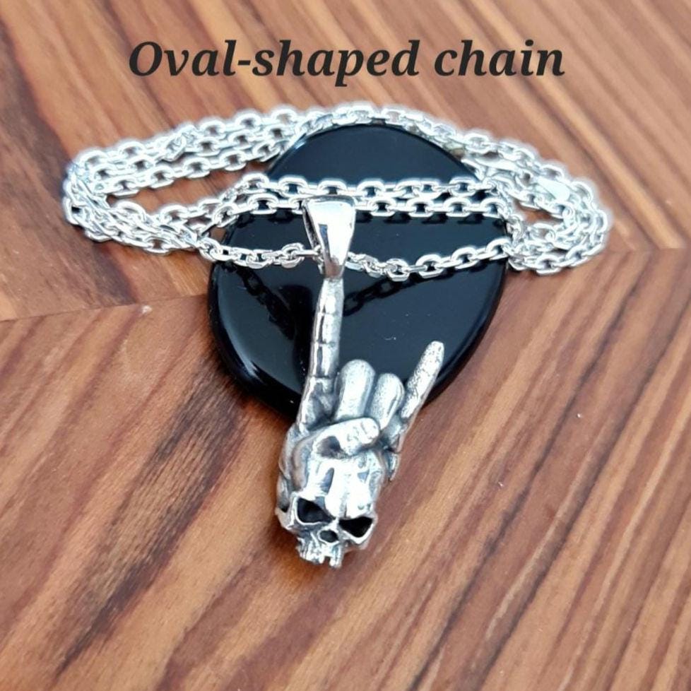 Sterling Silver Rock On Skull Pendant: Punk Gothic Jewelry